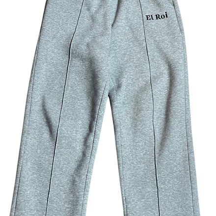Gray pleated sweatpants with 'EL ROI' logo embroidered on the left leg.
